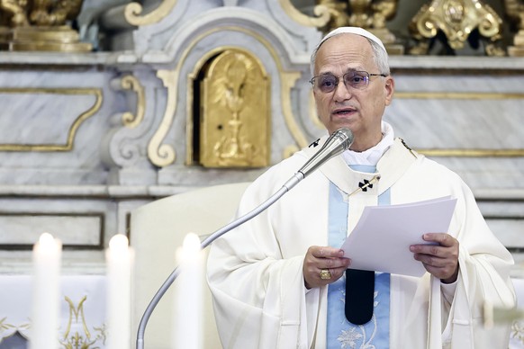 Pope Leo XIV celebrates a mass inside the St. Thomas of Villanova Church in Castel Gandolfo, Italy, Friday, Aug.15, 2025. (Angelo Carconi/Pool Via AP)
Italy Pope