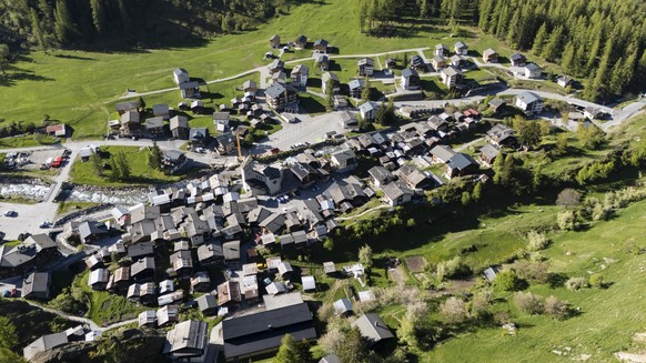 epa12113503 A picture taken with a drone shows the village of Blatten in the Loetschental, in Blatten, Switzerland, 18 May 2025. Following a mudslide in recent days, some of the residents of the villa ...