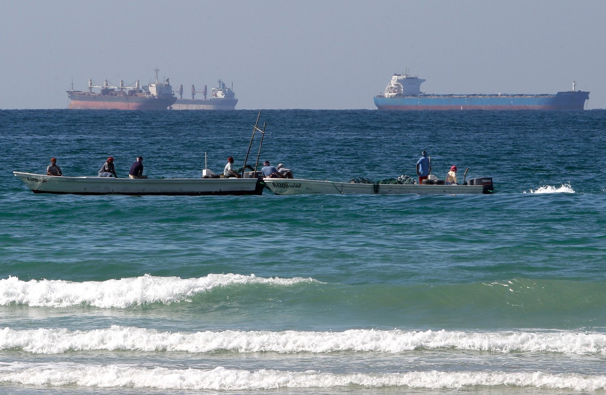 FILE - Fishermen work in front of oil tankers south of the Strait of Hormuz Jan. 19, 2012, offshore the town of Ras Al Khaimah in United Arab Emirates. (AP Photo/Kamran Jebreili, File)
Oil Prices
