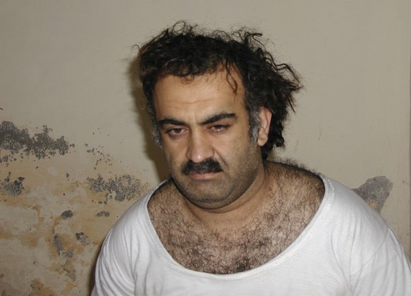 FILE- Khalid Sheikh Mohammed, the alleged Sept. 11 mastermind, is seen shortly after his capture during a raid in Pakistan Saturday March 1, 2003 in this photo obtained by the Associated Press. The ma ...