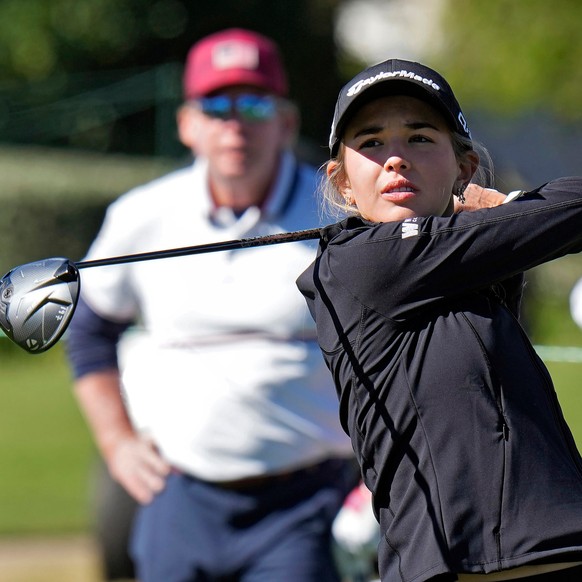 Kai Trump, granddaughter of President Donald Trump, tees off on the 11th hole during a pro-am for The Annika LPGA golf tournament, Wednesday, Nov. 12, 2025, in Belleair, Fla. (AP Photo/Chris O&#039;Me ...