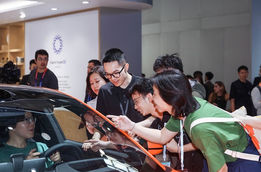 Probesitzen: Xiaomis SU7 ist das begehrteste Auto an der Beijing Auto Show 2024.