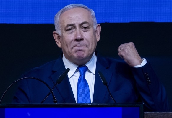 epa07495358 Israel&#039;s Prime Minister Benjamin Netanyahu (R) delivers a victory speech following the election in Tel Aviv, Israel, early 10 April 2019. Television predictions gave both Benjamin Net ...