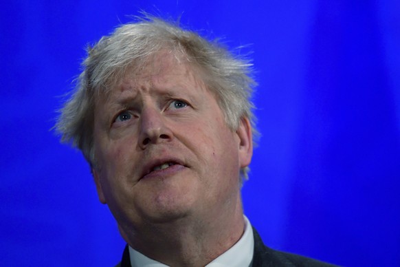 Britain&#039;s Prime Minister Boris Johnson reacts during a news conference at 10 Downing Street, amid the coronavirus disease outbreak, in London, Tuesday April 20, 2021. (Toby Melville/Pool via AP)