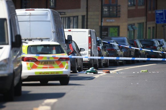 epa10688221 The scene in Ikleston Road in Ikleston Road in Nottingham, Britain, 13 June 2023, where three people have been found dead following what police describe as an &#039;horrific and tragic inc ...