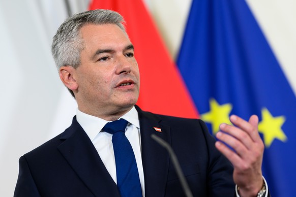 epa11469932 Austria&#039;s Chancellor Karl Nehammer speaks during a joint press conference with Indian prime minister in Vienna, Austria, 10 July 2024. It is the first visit by an Indian head of gover ...