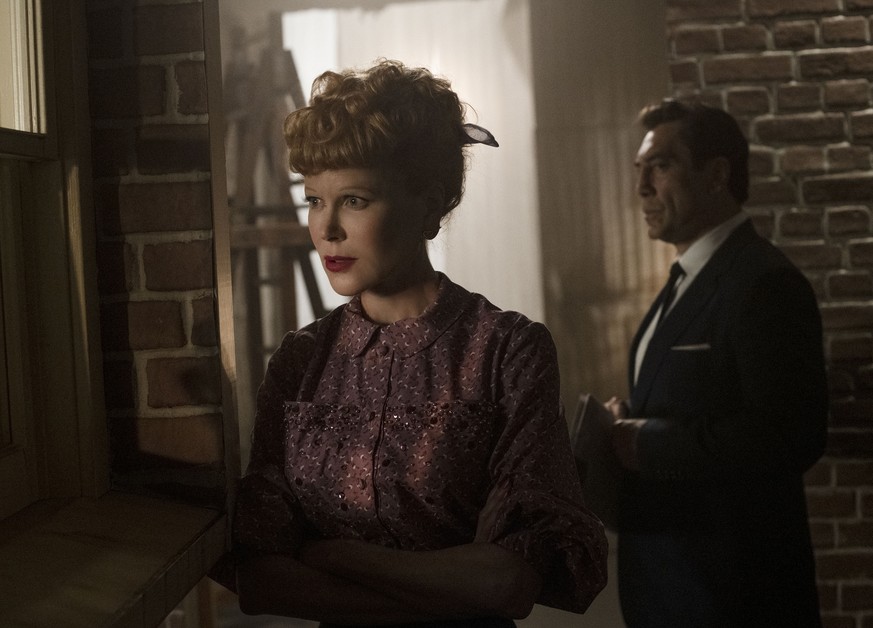 This image released by Amazon shows Nicole Kidman as Lucille Ball, left, and Javier Bardem as Desi Arnaz in a scene from &quot;Being the Ricardos.&quot; (Glen Wilson/Amazon via AP)