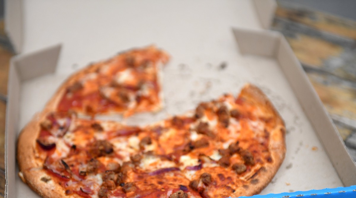 epa06146566 A pizza is seen at a Domino's Pizza store in Sydney, New South Wales, Australia, 15 August 2017. Shares in Domino's Pizza have fallen sharply after the fast food retailer's  ...