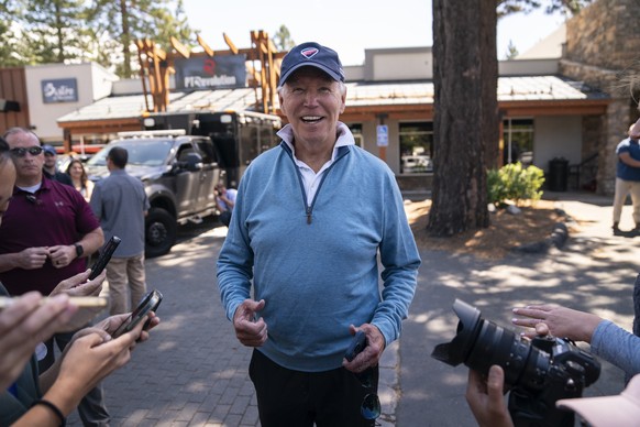 President Joe Biden talks with reporters after taking a Pilates and spin class at PeloDog, Friday, Aug. 25, 2023, in South Lake Tahoe, Calif. (AP Photo/Evan Vucci)
Joe Biden