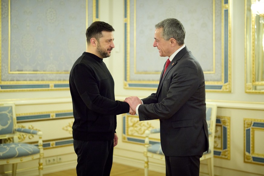 KEYPIX - In this photo provided by Ukraine's presidential press office, Ukrainian President Volodymyr Zelenskyy, left, shakes hands with OSCE Chairman-in-office Ignazio Cassis, in Kyiv, Ukraine,  ...