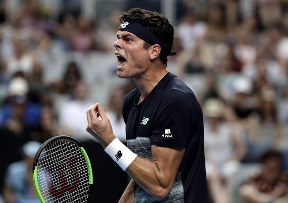 epa05743590 Milos Raonic of Canada reacts during the round four of the Men&#039;s Singles match against Roberto Bautista Agut of Spain at the Australian Open Grand Slam tennis tournament in Melbourne, ...