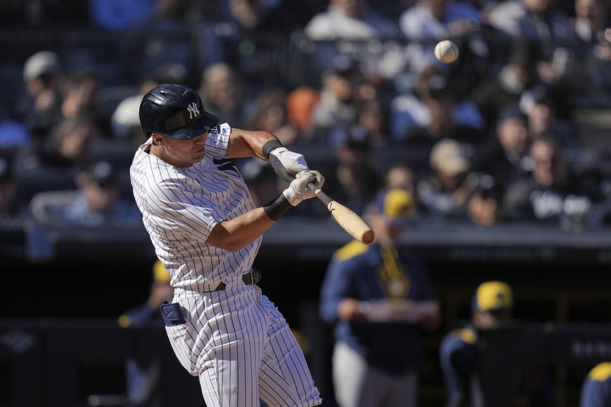 New York Yankees&#039; Anthony Volpe hits a solo home run during the second inning an opening-day baseball game against the Milwaukee Brewers at Yankee Stadium, Thursday, March 27, 2025, in New York.  ...