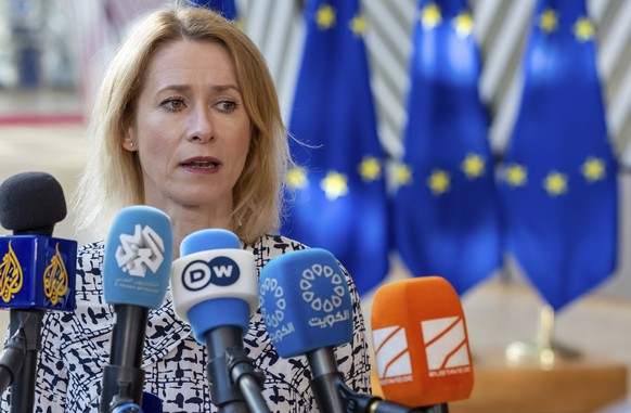 European Union foreign policy chief Kaja Kallas talks with journalists as she arrives for an EU foreign ministers meeting at the EU Council building in Brussels, Tuesday, July 15, 2025. (AP Photo/Geer ...