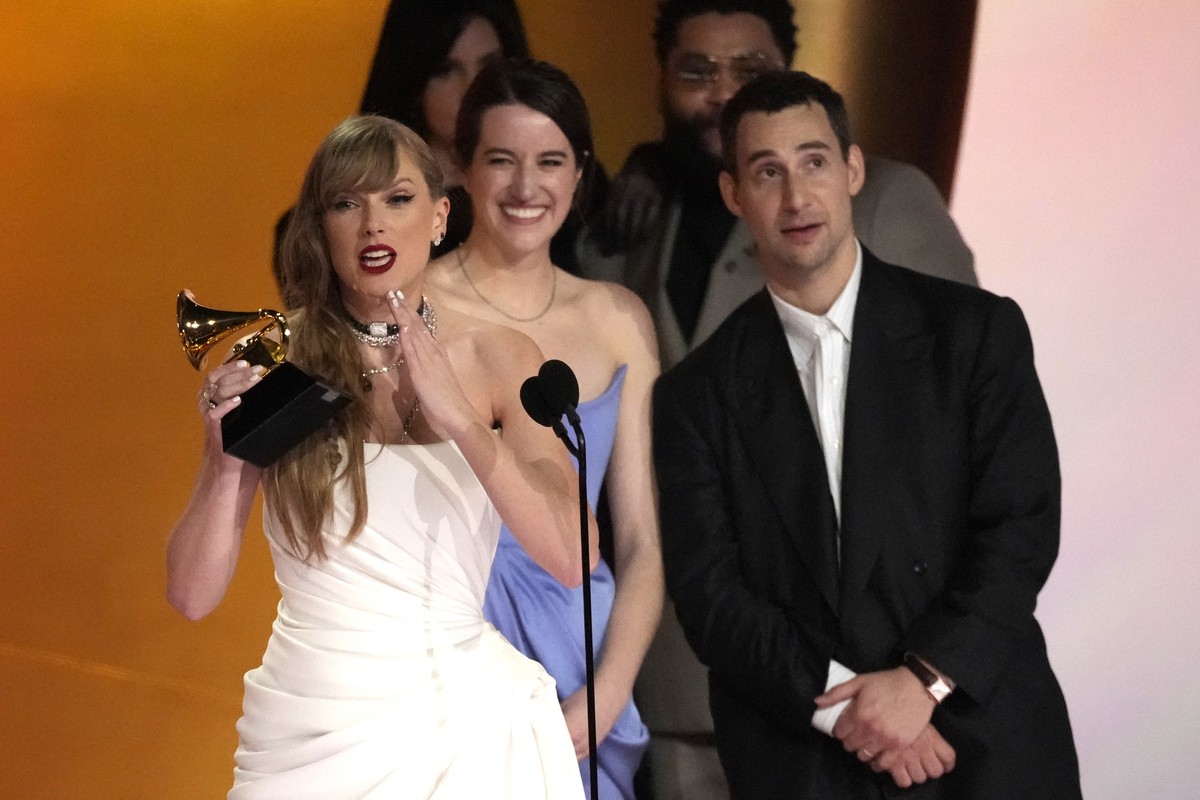 Taylor Swift accepts the award for album of the year for "MIdnights" during the 66th annual Grammy Awards on Sunday, Feb. 4, 2024, in Los Angeles. (AP Photo/Chris Pizzello)
Taylor Swift,Jack ...