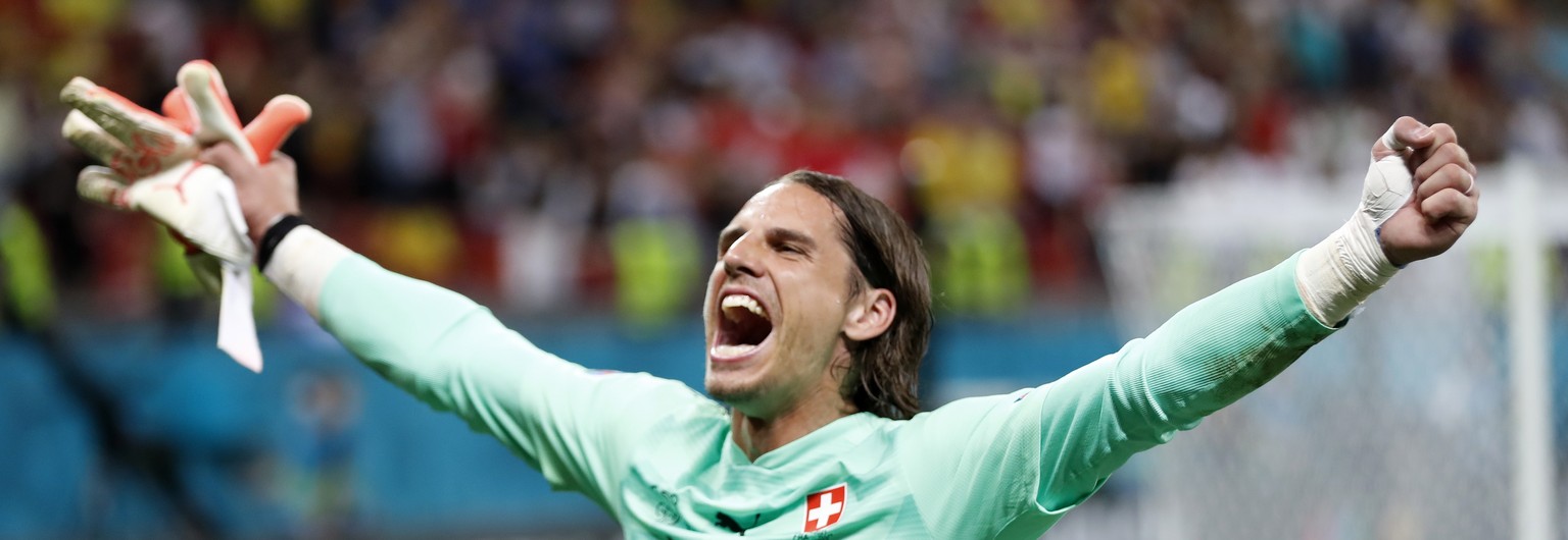 epa09309716 Goalkeeper Yann Sommer of Switzerland celebrates saving the penalty kick of Kylian Mbappe of France during the penalty shoot-out of the UEFA EURO 2020 round of 16 soccer match between Fran ...