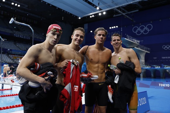 epa09370967 (L-R) Roman Mityukov, Antonio Djakovic, Noe Ponti and Nils Liess of Switzerland pose for a photo after qualifying for the Final in of the men&#039;s 4x200m Freestyle Relay Heats during the ...