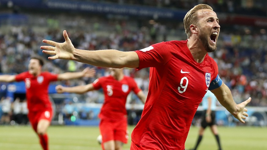 epa06819896 Harry Kane of England celebrates after scoring the winning goal during the FIFA World Cup 2018 group G preliminary round soccer match between Tunisia and England in Volgograd, Russia, 18 J ...