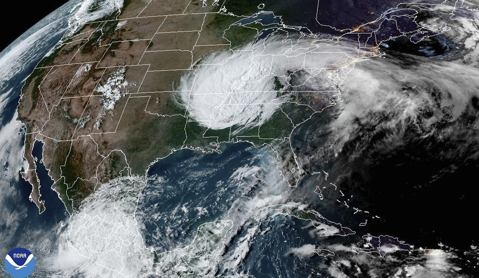 This satellite image from the National Oceanic and Atmospheric Administration taken at 6:11pm ET shows Hurricane Helene, which weakened into a post-tropical cyclone, over the United States on Friday,  ...