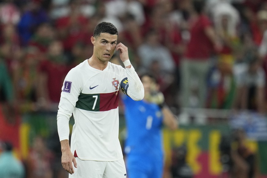 Portugal&#039;s Cristiano Ronaldo walks on the pitch during the World Cup quarterfinal soccer match between Morocco and Portugal, at Al Thumama Stadium in Doha, Qatar, Saturday, Dec. 10, 2022. (AP Pho ...