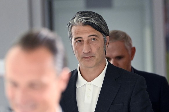 epa09407300 Swiss soccer coach Murat Yakin arrives to a press conference where he is presented as the new coach of Switzerland's national team in Muri, Switzerland, 09 August 2021. EPA/Alessandro ...