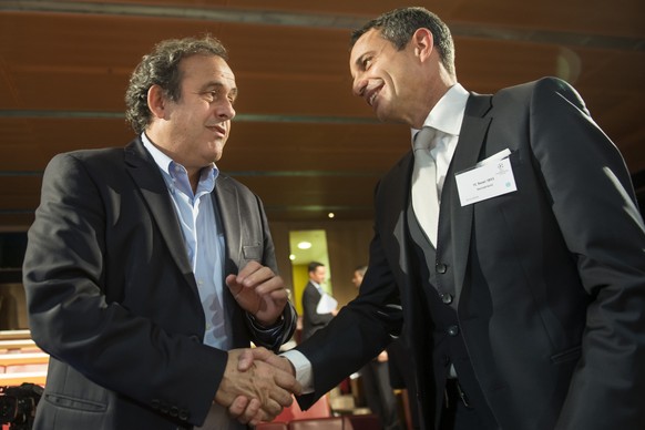 FCB-Präsident Heusler mit UEFA-Präsident Platini (links).