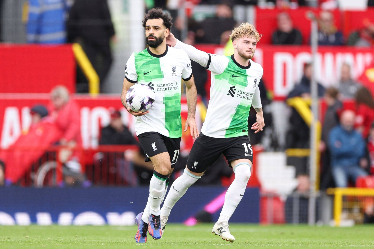 Mohamed Salah of Liverpool L celebrates scoring a goal for their side to make it 2-2 with Harvey Elliott of Liverpool R Manchester United, ManU v Liverpool, Premier League, Football, Old Trafford, Man ...