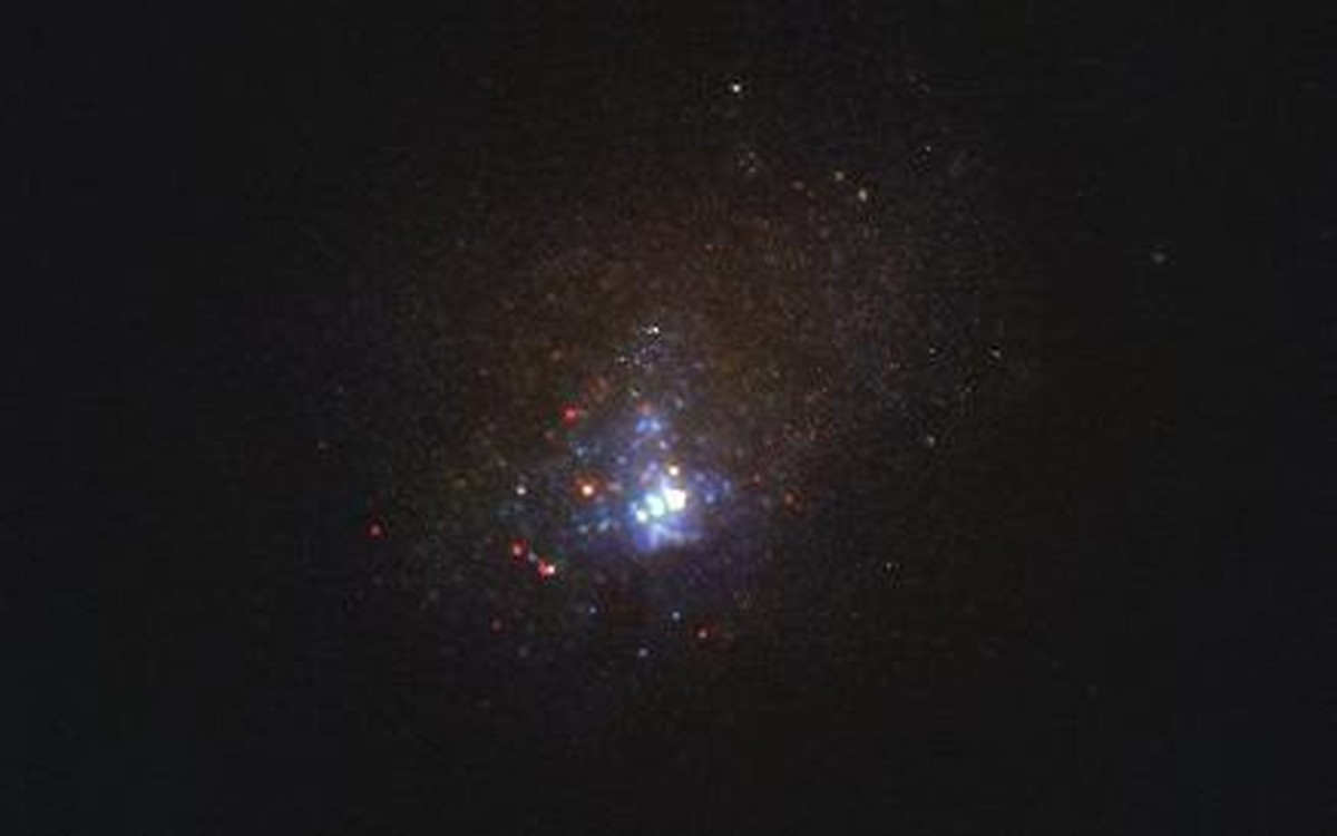 The Kinman Dwarf galaxy, also known as PHL 293B, taken with the NASA/ESA Hubble Space Telescope’s Wide Field Camera 3 in 2011, before the disappearance of the massive star. Located some 75 million lig ...
