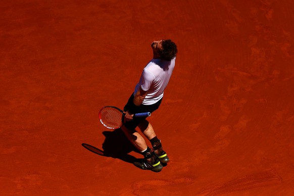 PARIS, FRANCE - JUNE 06: Andy Murray of Great Britain reacts in his Men's Semi Final match against Novak Djokovic of Serbia on day fourteen of the 2015 French Open at Roland Garros on June 6, 201 ...