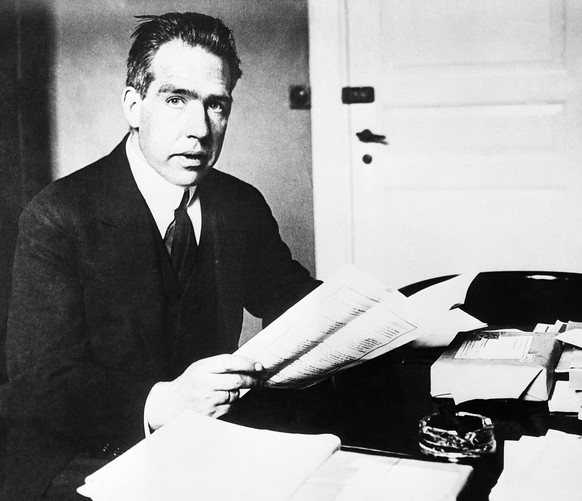 Danish physicist Niels Bohr is seen at his desk, 1933. (AP Photo)