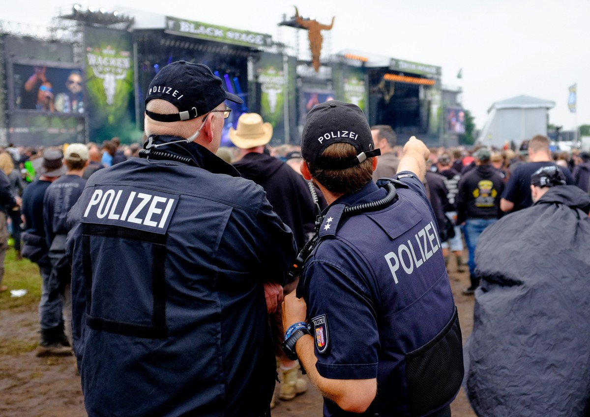 epa05455051 Policemen control the grounds of the Wacken Open Air, in Wacken, Germany, 04 August 2016. The W:O:A festival is the world's largest heavy metal music event and runs until 06 August. E ...
