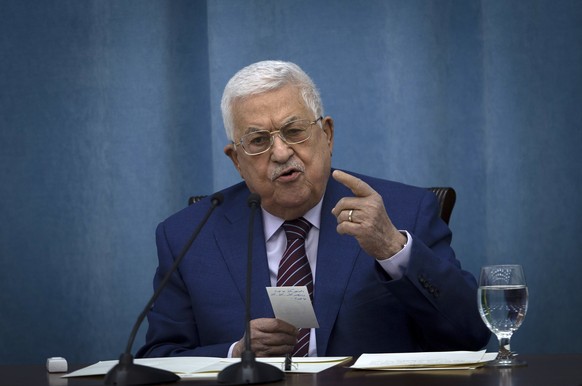Palestinian President Mahmoud Abbas speaks a meeting of the PLO executive committee and a Fatah Central Committee at the Palestinian Authority headquarters, in the West Bank city of Ramallah, Wednesda ...