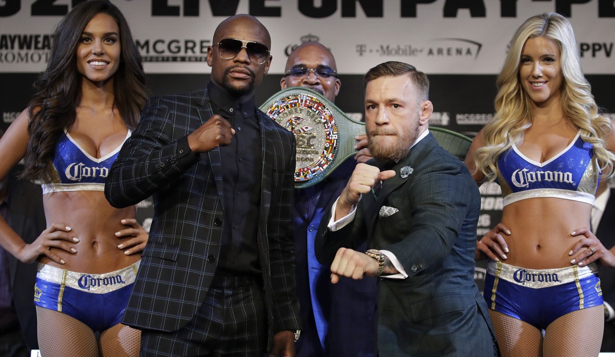 Floyd Mayweather Jr., left, and Conor McGregor pose for photographers during a news conference Wednesday, Aug. 23, 2017, in Las Vegas. The two are scheduled to fight in a boxing match Saturday in Las ...