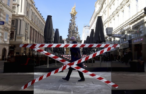 Closed areas of coffee houses pictured in downtown in Vienna, Austria, Monday, Feb. 15, 2021. The Austrian government has moved to restrict freedom of movement for people, in an effort to slow the ons ...