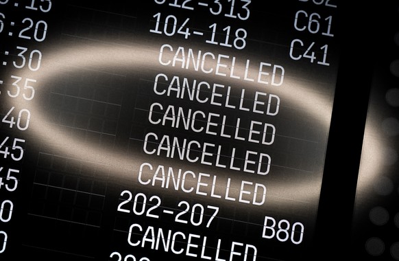 epaselect epa10248234 A reflection on an electronic board showing some cancelled flights at the Cologne Bonn Airport in Cologne, Germany, 17 October 2022. Lufthansa&#039;s subsidiary airline Eurowings ...