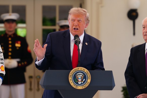 epa13109100 US President Donald Trump delivers remarks as he hosts top IndyCar drivers at the White House in Washington, DC, USA, 13 July 2026, to promote the inaugural Freedom 250 Grand Prix. The rac ...