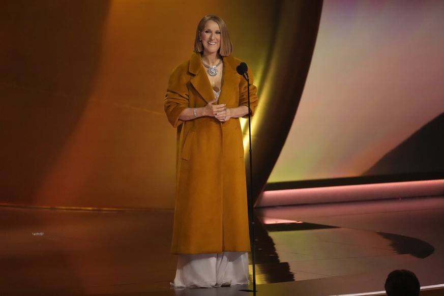 Celine Dion presents the award for album of the year during the 66th annual Grammy Awards on Sunday, Feb. 4, 2024, in Los Angeles. (AP Photo/Chris Pizzello)
Celine Dion