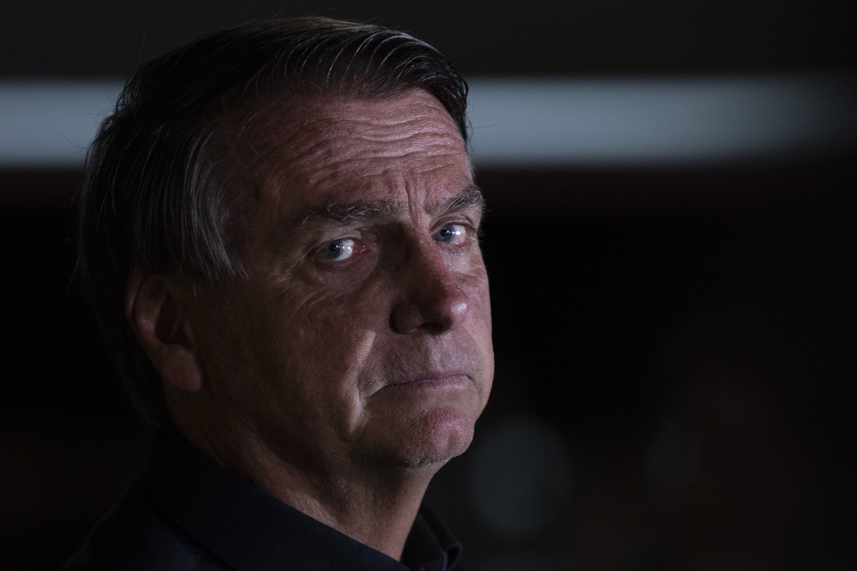 epa10220662 Brazilian president and candidate for re-election, Jair Bolsonaro, holds a press conference, at the Palacio do Alvorada in Brasilia, Brazil, 02 October 2022. Former President Luiz Inacio L ...