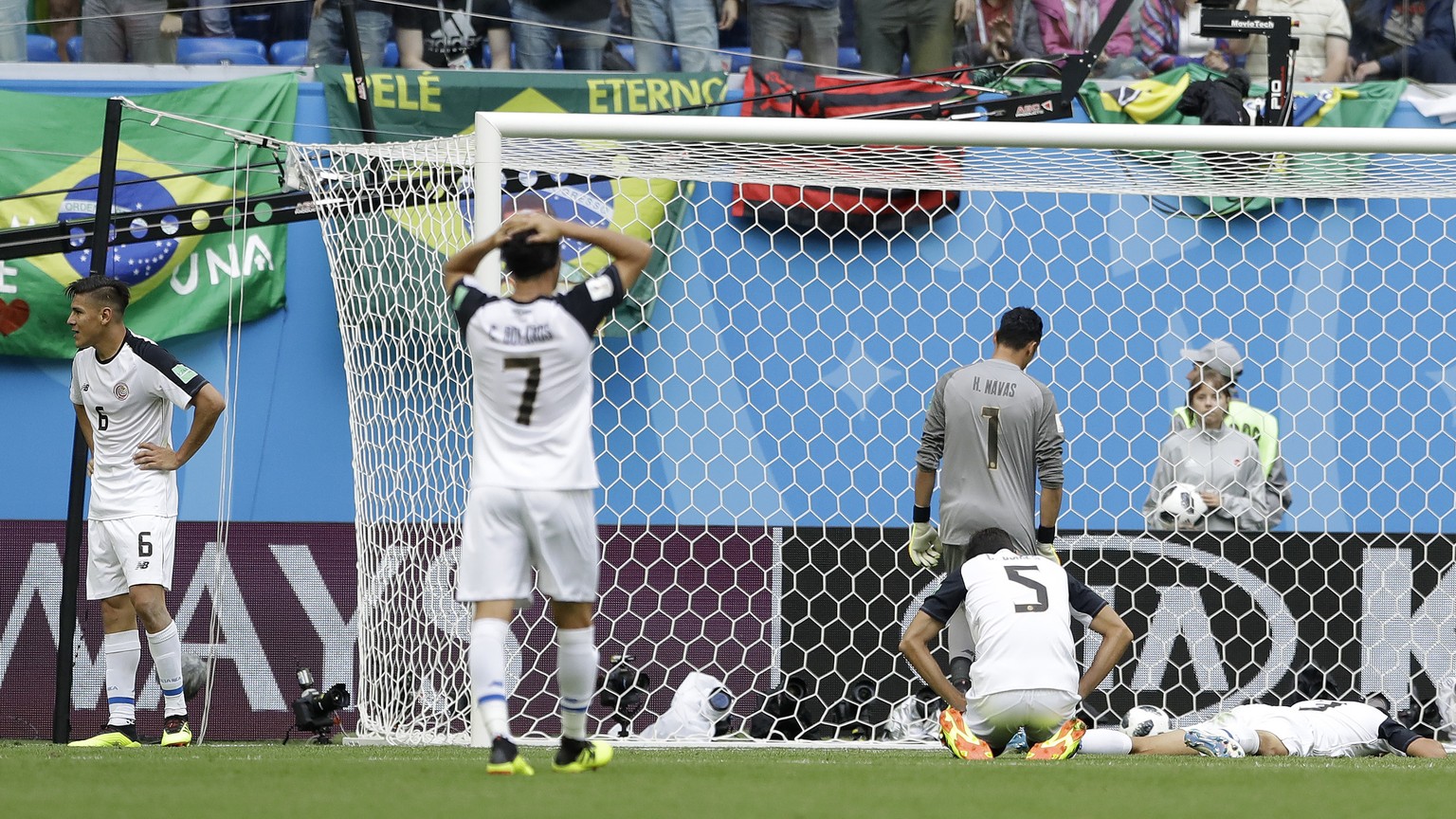 Costa Rica players react after Brazil&#039;s Philippe Coutinho scored the opening goal during the group E match between Brazil and Costa Rica at the 2018 soccer World Cup in the St. Petersburg Stadium ...