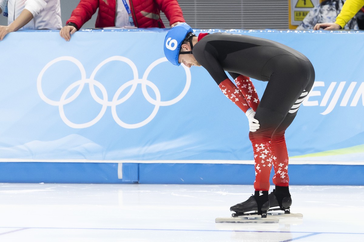 Switzerland's Livio Wenger #6 reacts after the men's Speed Skating Mass Start final at the 2022 Winter Olympics in Beijing, China, on Saturday, February 19, 2022. (KEYSTONE/Salvatore Di Nolf ...