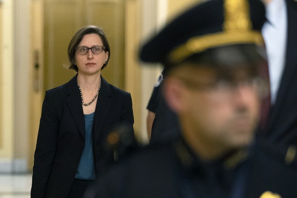 Deputy Assistant Secretary of Defense Laura Cooper arrives for a closed door meeting to testify as part of the House impeachment inquiry into President Donald Trump, Wednesday, Oct. 23, 2019, on Capit ...