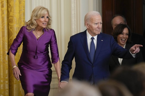 First lady Jill Biden, President Joe Biden, Vice President Kamala Harris and her husband Doug Emhoff arrive for an event in the East Room of the White House in Washington, Wednesday, March 22, 2023, t...