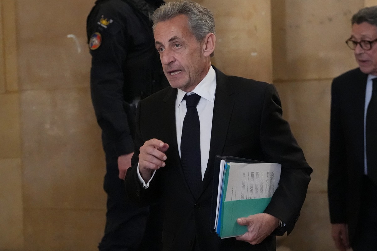 Former French President Nicolas Sarkozy arrives at the appeals courthouse in Paris, France, Monday, March 16, 2026, for his trial over alleged illegal financing of his 2007 presidential campaign by th ...