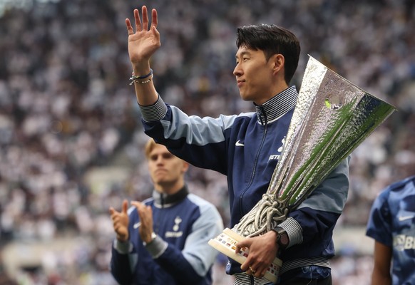 epa12134685 Son Heung-Min of Tottenham holds the UEFA Europa League winners trophy during a lap of honour after the English Premier League match between Tottenham Hotspur vs Brighton &amp; Hove Albion ...
