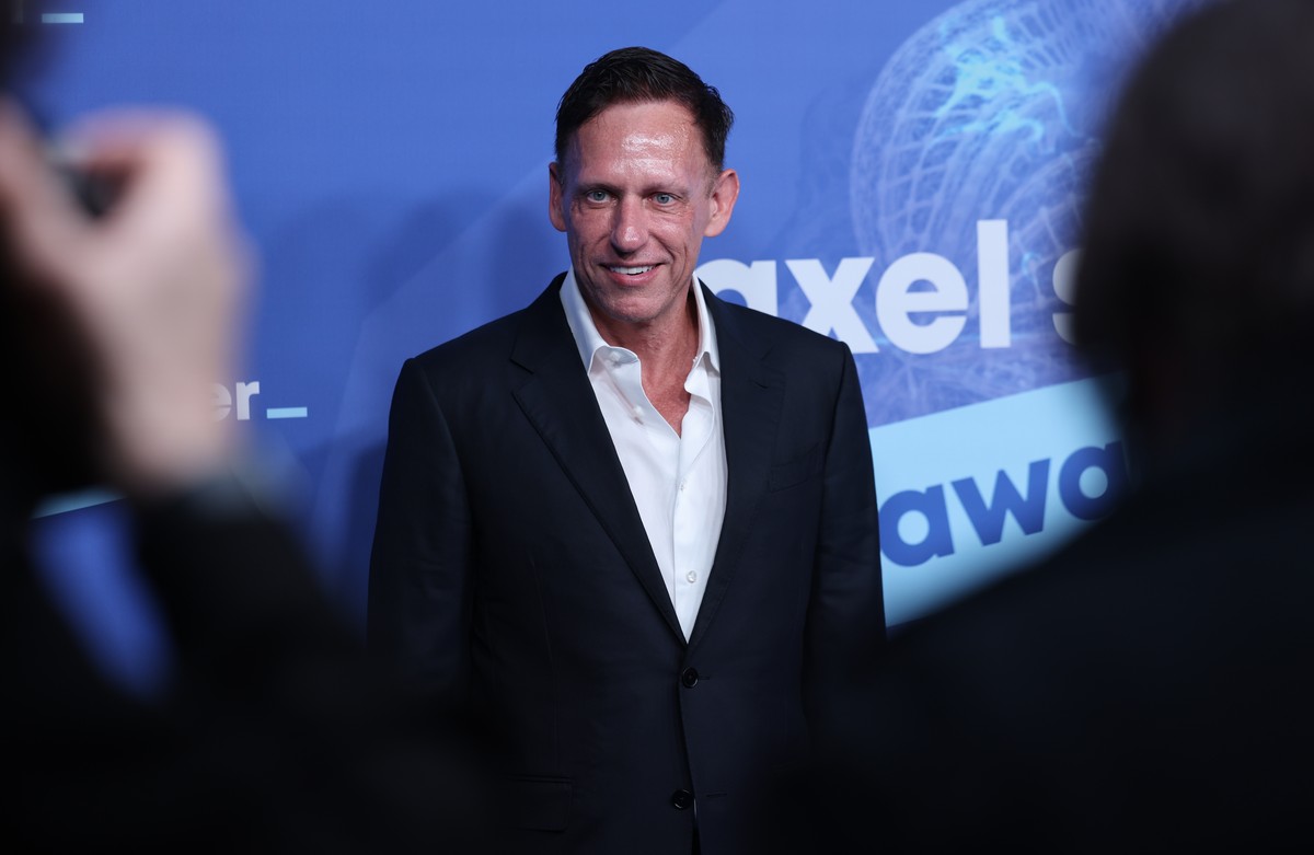 epa13260303 U.S. billionaire venture capitalist Peter Thiel poses on the blue carpet prior to the award ceremony of the 2026 Axel Springer Award in Berlin, Germany, 24 September 2026. According to Axe ...