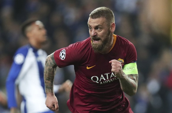 FILE - In this March 6, 2019 file photo, Roma midfielder Daniele De Rossi celebrates after scoring his side&#039;s first goal during the Champions League round of 16, 2nd leg, soccer match between FC  ...