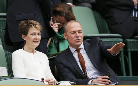 Swiss Federal Councillor Simonetta Sommaruga (L) on Centre Court at the Wimbledon Tennis Championships in London, July 12, 2015. REUTERS/Stefan Wermuth