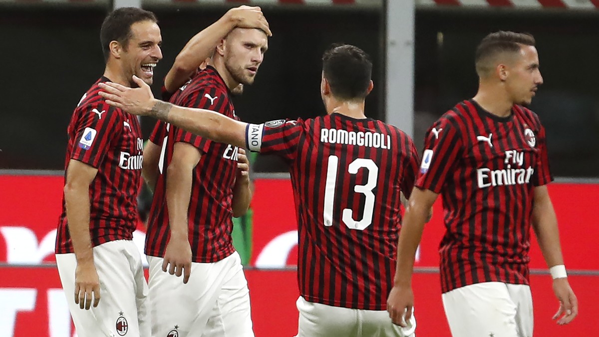 AC Milan's Ante Rebic, center left, celebrates with his teammates his goal against Juventus during the Serie A soccer match between AC Milan and Juventus at the San Siro stadium, in Milan, Italy, ...