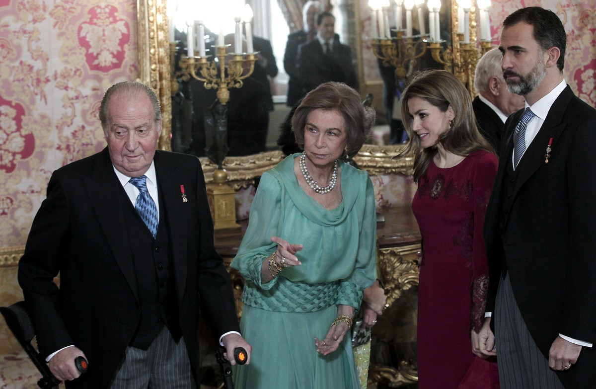 FILE - From left to right: Spain's former King Juan Carlos, Spain's former Queen Sofia, Spain's Queen Letizia, and Spain's King Felipe VI at the Royal Palace in Madrid, Wednesday J ...