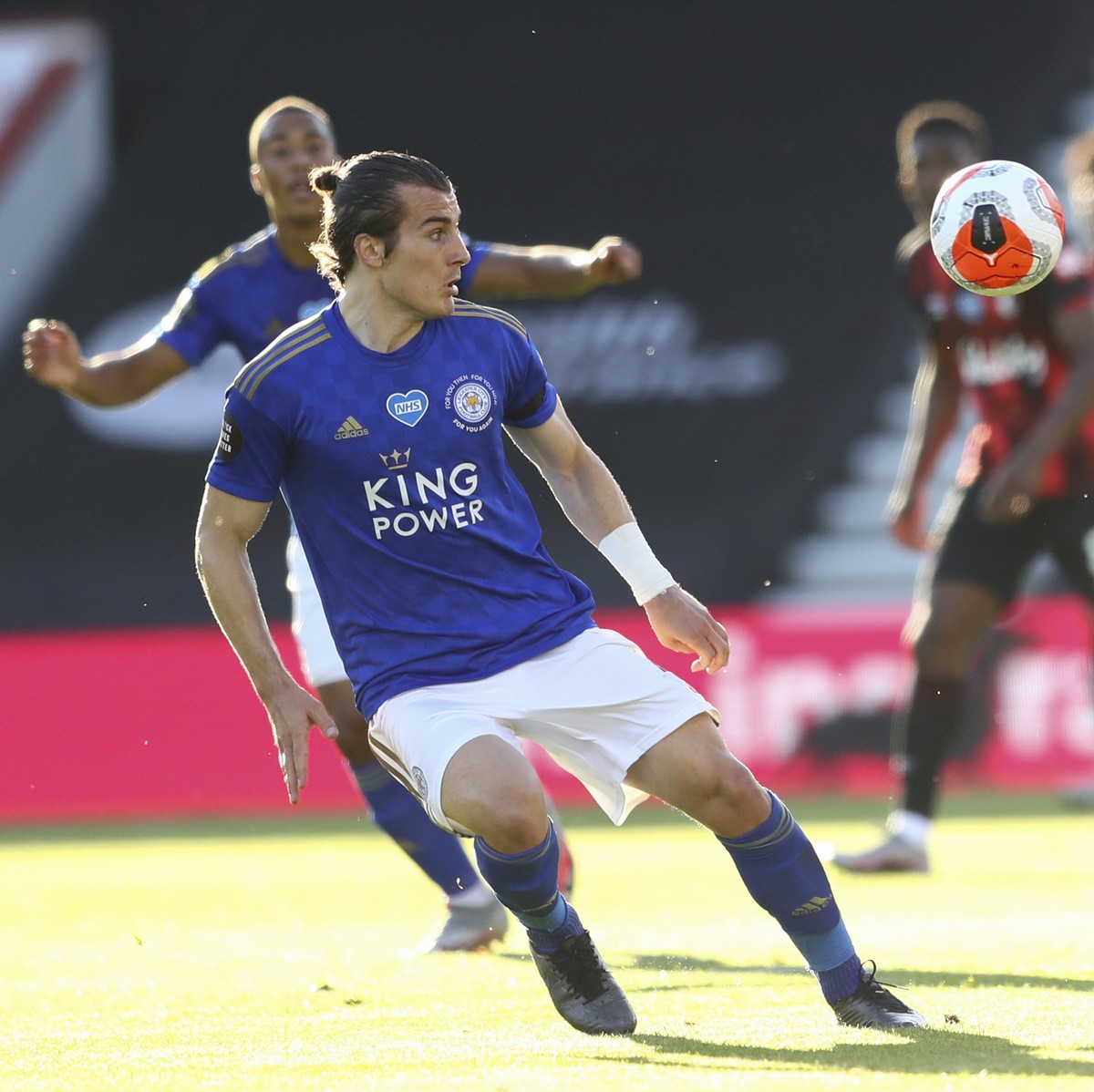 Bournemouth's Callum Wilson, right, and Leicester's Caglar Soyuncu battle for the ball during the English Premier League soccer match between Bournemouth and Leicester City at Vitality Stadi ...