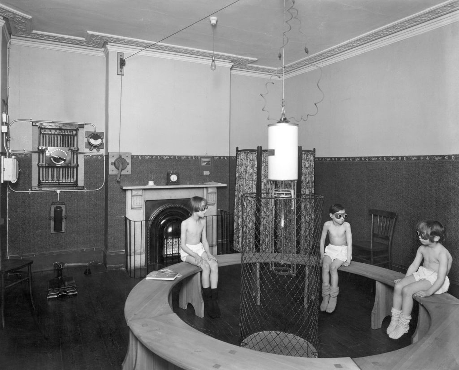 Treatment room, Belgrave Hospital for Children, London, 1928. Children are given artifical sunlight treatment to help combat tuberculosis at the Belgrave Hospital for Children. Heliotherapy ('sun ...